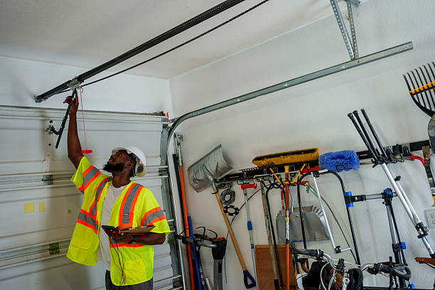 Professional Garage Door Panel Replacement technician working in Enon, OH